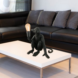 lampe singe assis