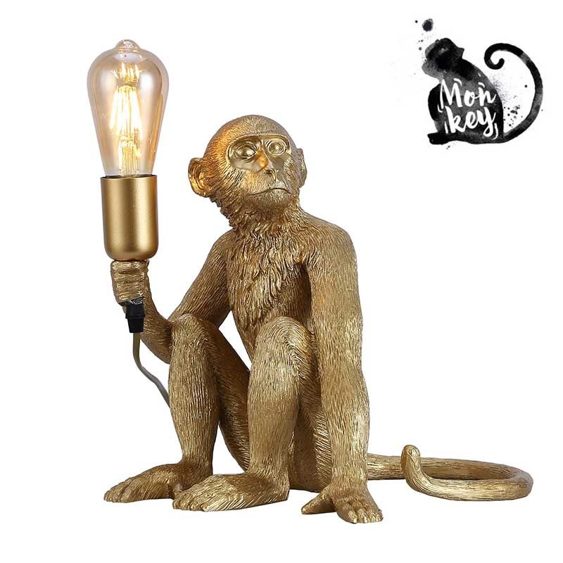 lampe singe dorée