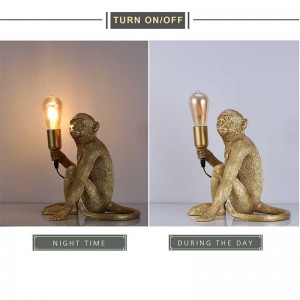 lampe à poser singe doré