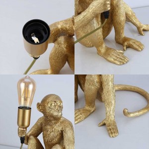 lampe singe plaquée or