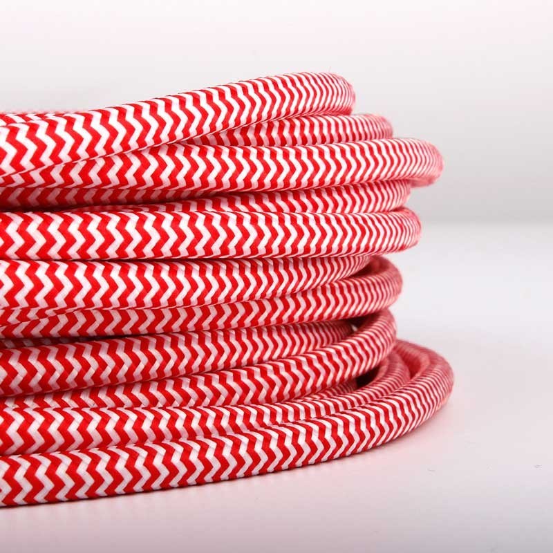 Câble électrique rond recouvert d'un tissu à effet soie en zigzag, rouge et blanc