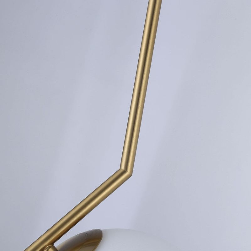 Sphère en verre et support sont reliés entre eux par un point de jonction restreint Sphère en verre et support sont reliés entre eux par un point de jonction restreint