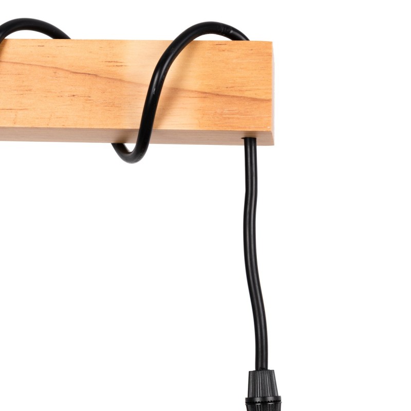 Câble enroulé sur la base en bois du lampadaire Câble enroulé sur la base en bois du lampadaire