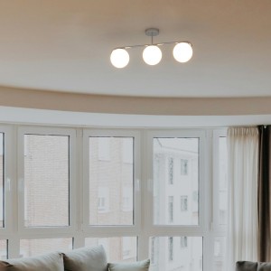 Plafonnier triple globe en...